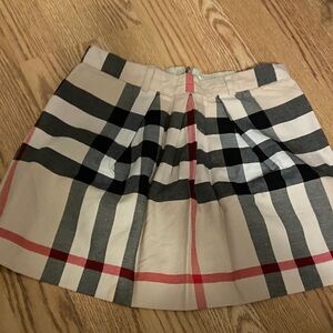 Kids Burberry A-Line Skirt in Black, Cream, and Pink Plaid
Used like new.